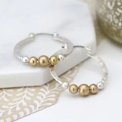 Mooch..... New Arrivals Peace Of Mind Silver Plated Silver Plated Silver And Gold Plated Hoops And Beads Earrings